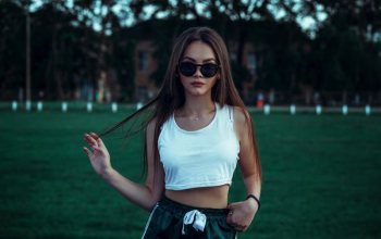 woman in white crop top woman in white crop top