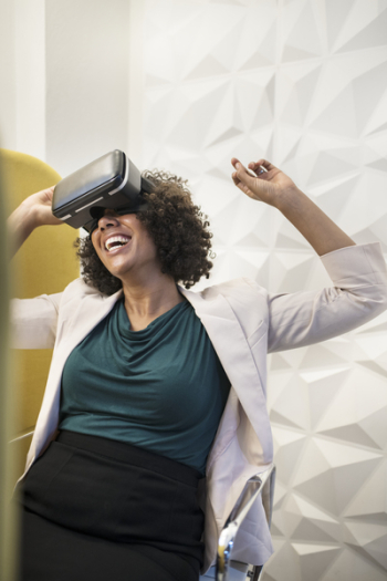 Woman in White Formal Coat Wearing Black Vr Headset Woman in White Formal Coat Wearing Black Vr Headset