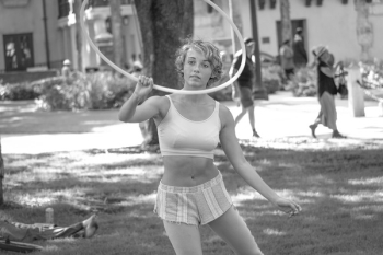 Woman In White Sports Bra And Shorts Holding Hoop Woman In White Sports Bra And Shorts Holding Hoop
