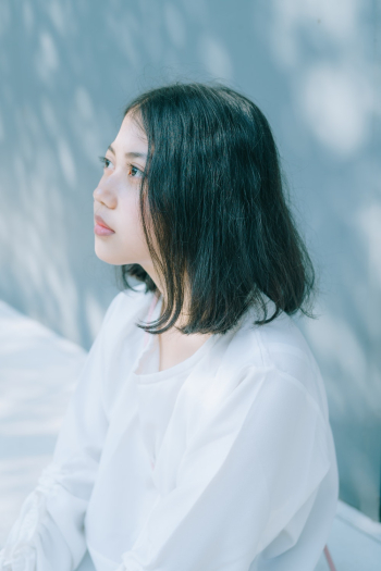 Woman in White Sweater Woman in White Sweater