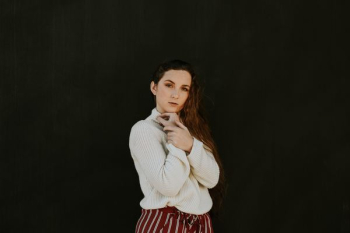 woman in white sweater woman in white sweater