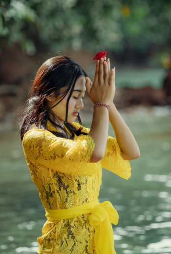 Woman in Yellow Dress Meditating Woman in Yellow Dress Meditating