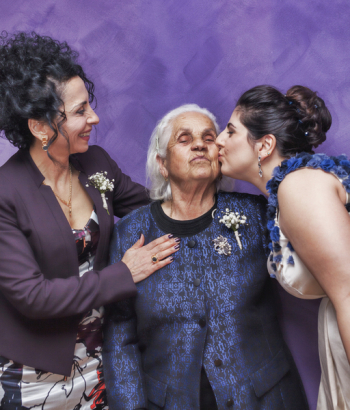 Woman Kissing Woman&#39;s Cheek