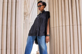 woman leaning on concrete pedestal column woman leaning on concrete pedestal column