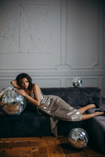 Woman Leaning on Mirror Ball Woman Leaning on Mirror Ball