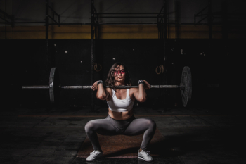 Woman Lifting Barbell Woman Lifting Barbell