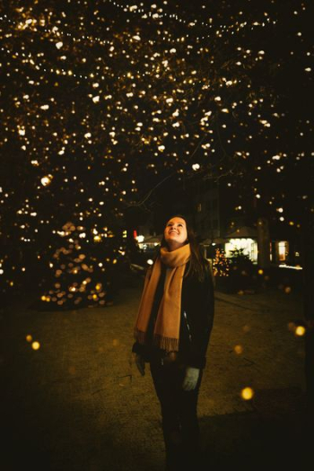 woman looking above a dark sky woman looking above a dark sky