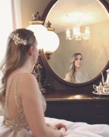 Woman Looking at Mirror Woman Looking at Mirror