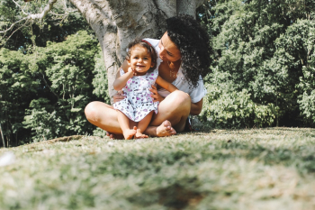 Woman Looking At Toddler Woman Looking At Toddler
