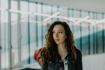 woman looking sideways indoors