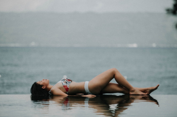 Woman Lying Down on Water