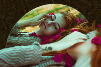 Woman Lying in Brown Grass Mirror Edited Photo Woman Lying in Brown Grass Mirror Edited Photo