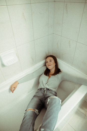 Woman Lying on Bath Tub Woman Lying on Bath Tub