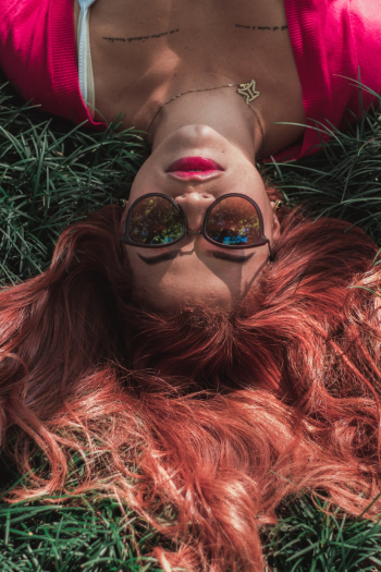 Woman Lying on Grass