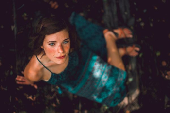 woman lying on grass