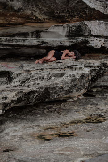 Woman Lying on Rocks Woman Lying on Rocks