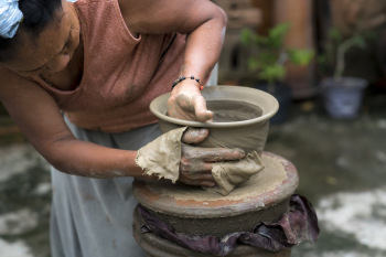 Woman Making Clay Jar Woman Making Clay Jar
