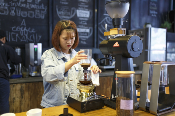 Woman Making Coffee Woman Making Coffee
