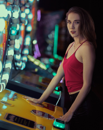 Woman Near Arcade Machine Woman Near Arcade Machine