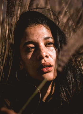Woman Near Tall Grass