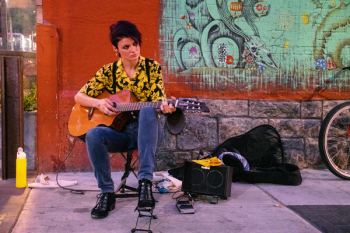 Woman Playing Acoustic Guitar Woman Playing Acoustic Guitar
