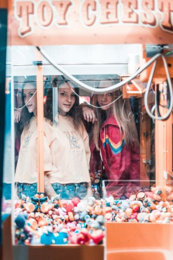 woman playing arcade woman playing arcade