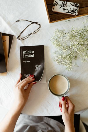 Woman read book and drink coffee Woman read book and drink coffee