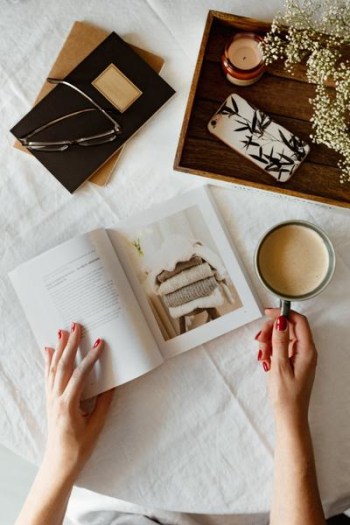 Woman read book and drink coffee Woman read book and drink coffee
