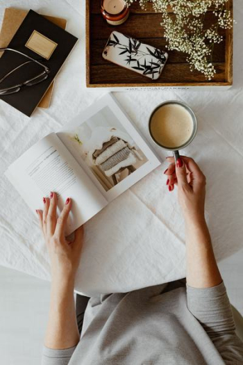 Woman read book and drink coffee Woman read book and drink coffee
