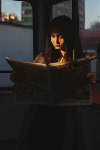 Woman Reading Newspaper Woman Reading Newspaper