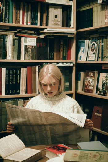 Woman Reading Newspaper Woman Reading Newspaper