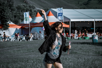 Woman Running On Grass