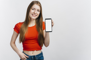 Woman showing her phone mock-up Free Photo