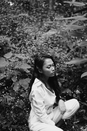 Woman Sitting Beside Plant Woman Sitting Beside Plant
