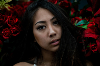 Woman Sitting Near Plant Woman Sitting Near Plant
