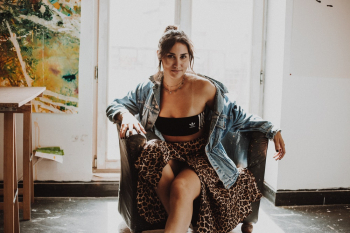 Woman Sitting on Armchair Woman Sitting on Armchair