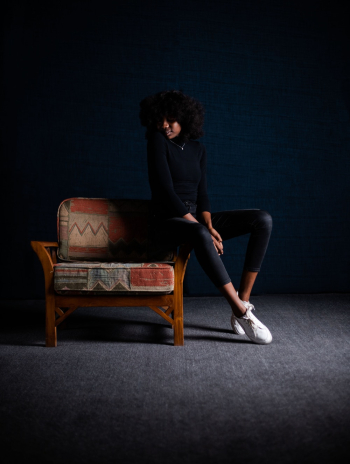 Woman Sitting on Armchair Woman Sitting on Armchair