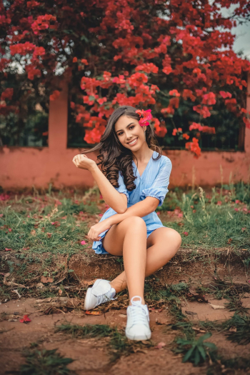 Woman Sitting on Grass