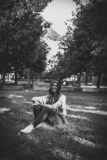 Woman Sitting On Grass