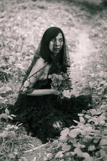 Woman Sitting on Grass