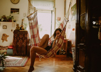 woman sitting on hammock woman sitting on hammock