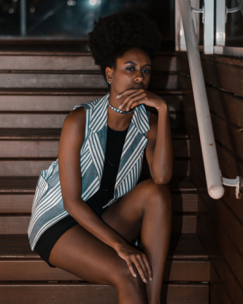 Woman Sitting on Stairs Posing for Photoshoot Woman Sitting on Stairs Posing for Photoshoot