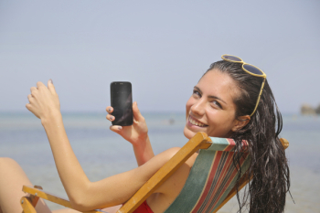 Woman Sitting On Sun Lounger Woman Sitting On Sun Lounger