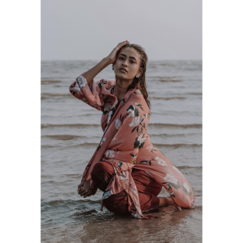 Woman Sitting on Water