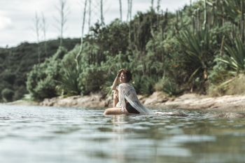 Woman Sitting on Water