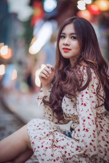 Woman Sitting Outdoors Woman Sitting Outdoors