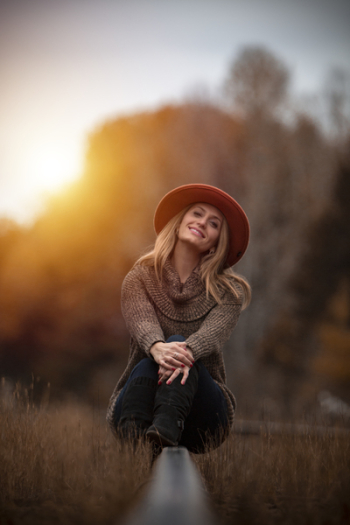 Woman Sitting Outdoors Woman Sitting Outdoors