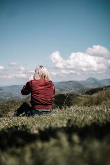 Woman Sitting Outdoors Woman Sitting Outdoors