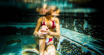 woman sitting underwater woman sitting underwater