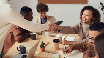 Woman Smiling Shaking Hands Woman Smiling Shaking Hands